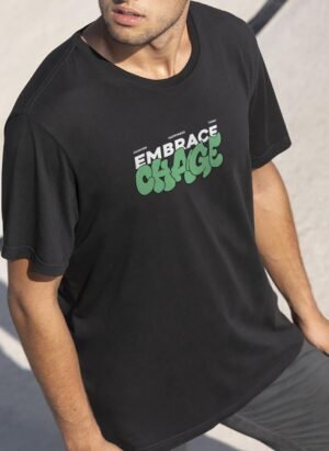 "EMBRACE GRACE" front print with artistic typography and soft green highlight.