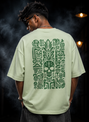 Back of the mint green Aztec Skull oversized T-shirt showing the green Mesoamerican glyph panel around a sugar skull